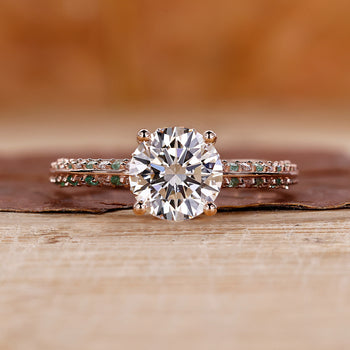 Round diamond ring with stunning pave diamond accents in a modern design.
