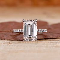 Emerald White Gold Ring with a stunning emerald cut diamond.