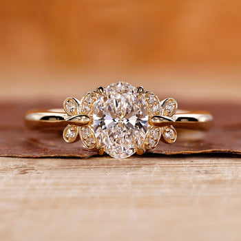 Oval diamond wedding ring featuring a stunning oval diamond engagement ring design.
