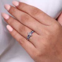 Leaf and vine engagement ring with marquise center
