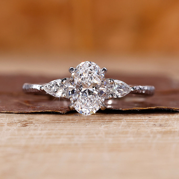 Three stone diamond engagement ring with elegant sparkle.
