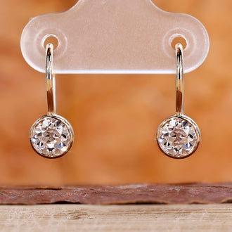 Round diamond earrings with a classic sparkle.
