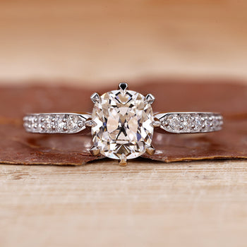 Cushion Cut Diamond Ring with stunning pave setting design.

