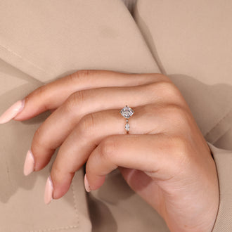 Compass prong setting holds cushion diamond.
