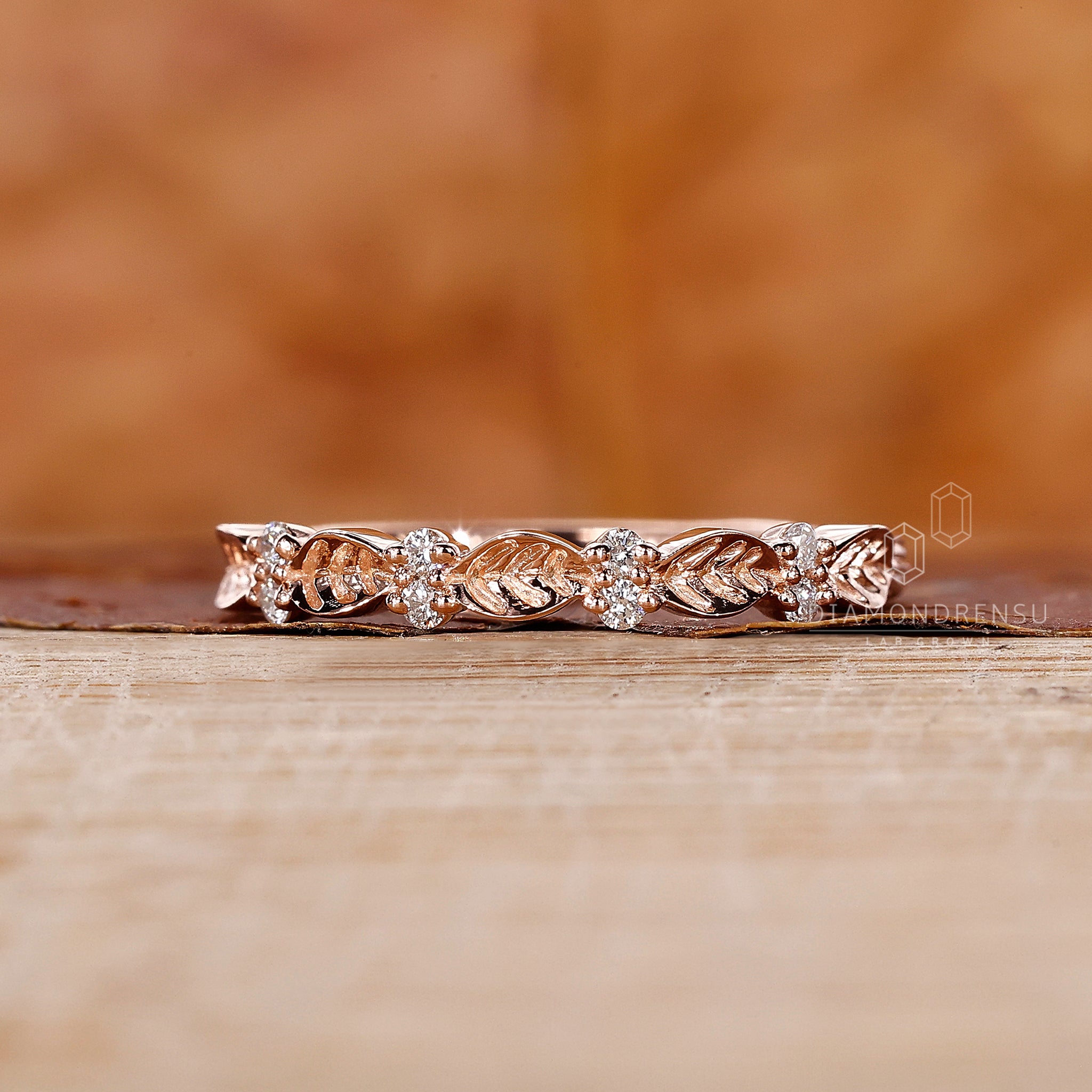 Handcrafted leaf wedding band with IGI certified lab grown diamond, perfect for nature lovers