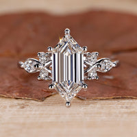 Elongated hexagon engagement ring in white gold.