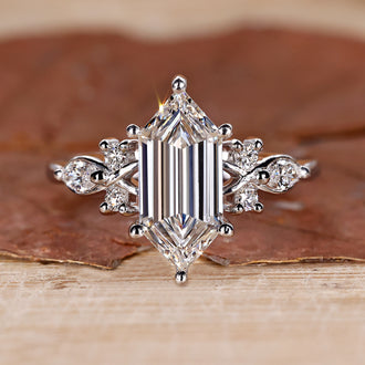 Elongated hexagon engagement ring in white gold.