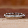 White gold wedding band with round diamond wedding band.
