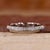 White gold wedding band with round diamond wedding band.
