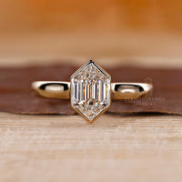 Yellow gold diamond ring with a custom engagement ring design
