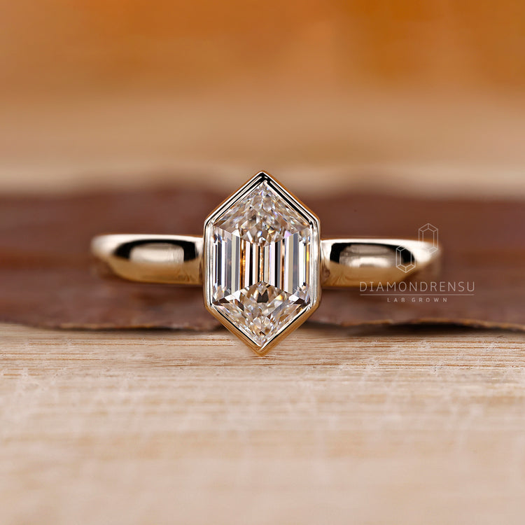 Yellow gold diamond ring with a custom engagement ring design
