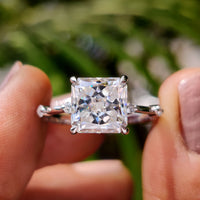 Radiant cut engagement ring with bold center stone.