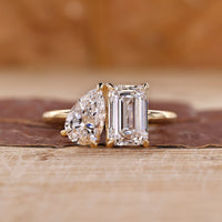 Toi et moi gold ring with pear and emerald cut diamonds.
