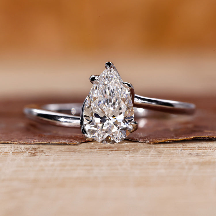 Pear Solitaire Engagement Ring with a stunning pear diamond.
