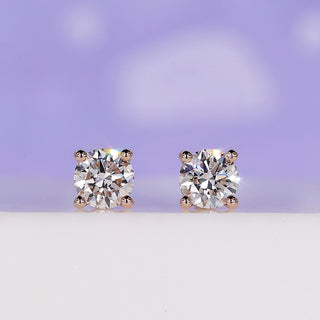 Rose Gold Diamond Stud Earrings with 0.70 TCW for timeless elegance.
