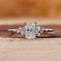 Elongated cushion cut diamond ring with a sparkling lab grown diamond in a prong setting.
