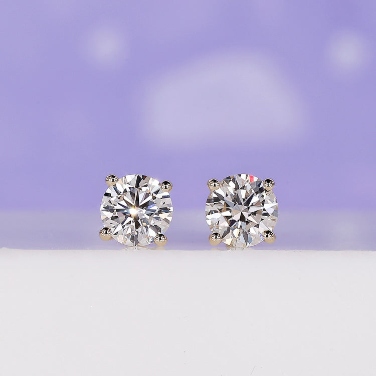 Stunning round diamond earrings crafted for timeless elegance.
