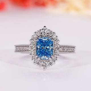 Radiant cut blue diamond ring with vintage halo engagement ring
