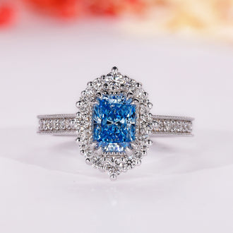Radiant cut blue diamond ring with vintage halo engagement ring

