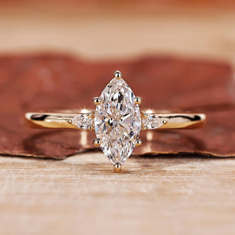Three Stone Marquise Engagement Ring with a stunning prong setting.
