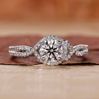 A beautiful twisted engagement ring with intricate design details and a modern touch.
