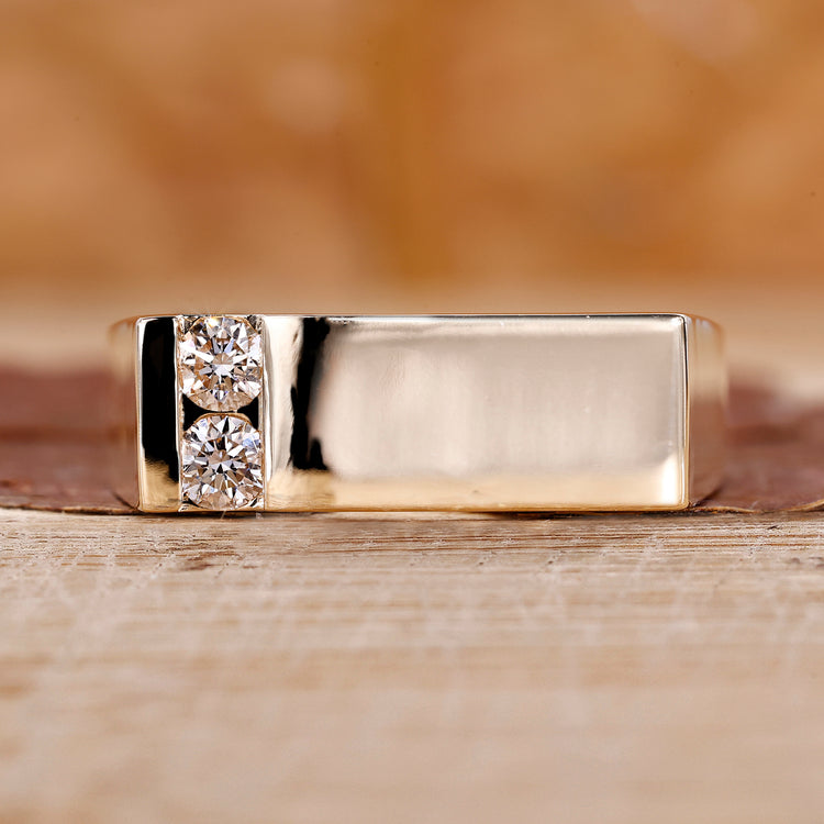 Mens gold signet ring in a polished finish.
