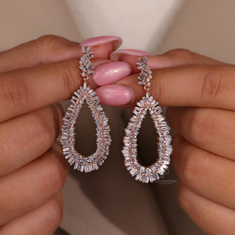 Handmade long drop earrings with diamond clusters
