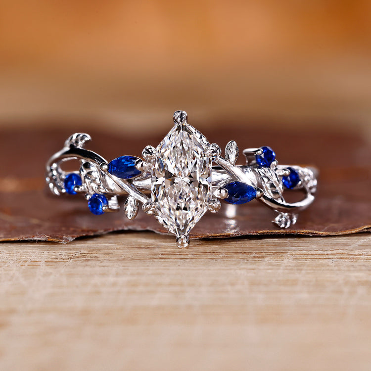 Dutch marquise nature inspired ring with leaf details
