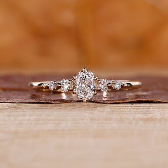 5 Stone Diamond Ring in yellow gold with oval cut diamonds.
