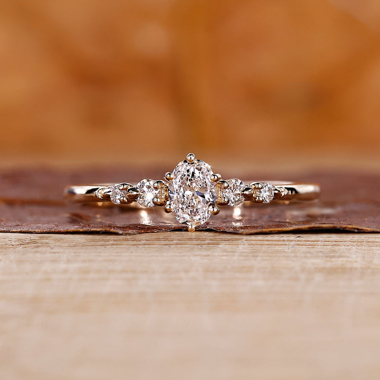 5 Stone Diamond Ring in yellow gold with oval cut diamonds.
