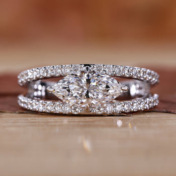 marquise of East West Marquise Engagement Ring with a delicate design.

