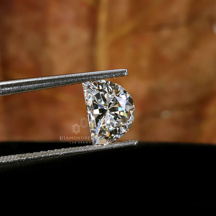 Unique lab grown diamond in half moon cut.