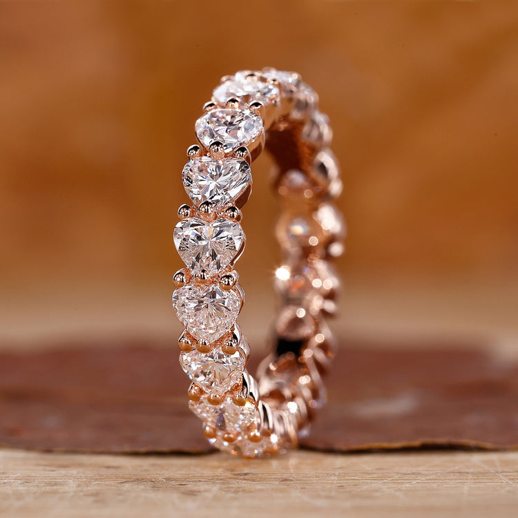 Elegant eternity wedding band with a seamless row of sparkling diamonds.
