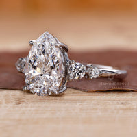 White gold engagement ring with prong setting.

