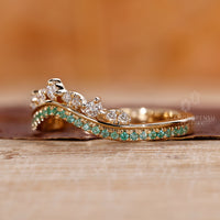 Unique green Emerald wedding band showcasing a vibrant gemstone for a bold look.