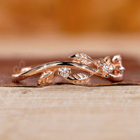 Round cut diamond leaf wedding band by Diamondrensu.

