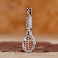 Custom diamond racket charm pendant with prong set and gold setting.
