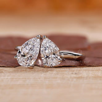 White Gold Engagement Ring with a stunning pear shaped diamond.
