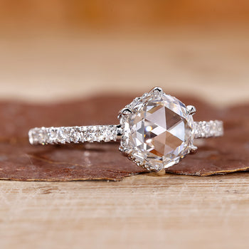 Rose cut engagement ring with a vintage-inspired design.
