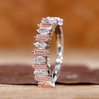Pink Baguette Cut diamonds set in a stylish white gold wedding band.

