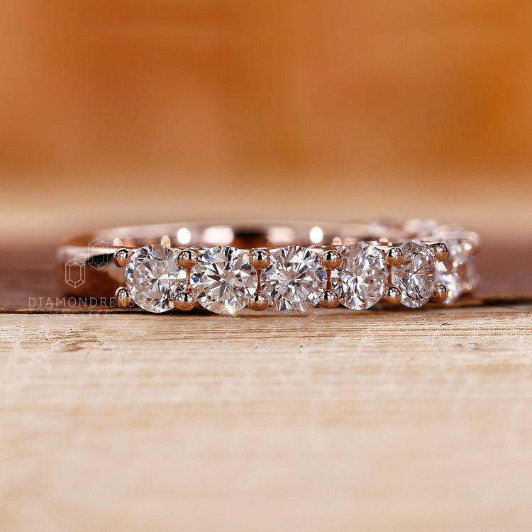 Prong setting wedding band showcasing secure and stylish diamonds.
