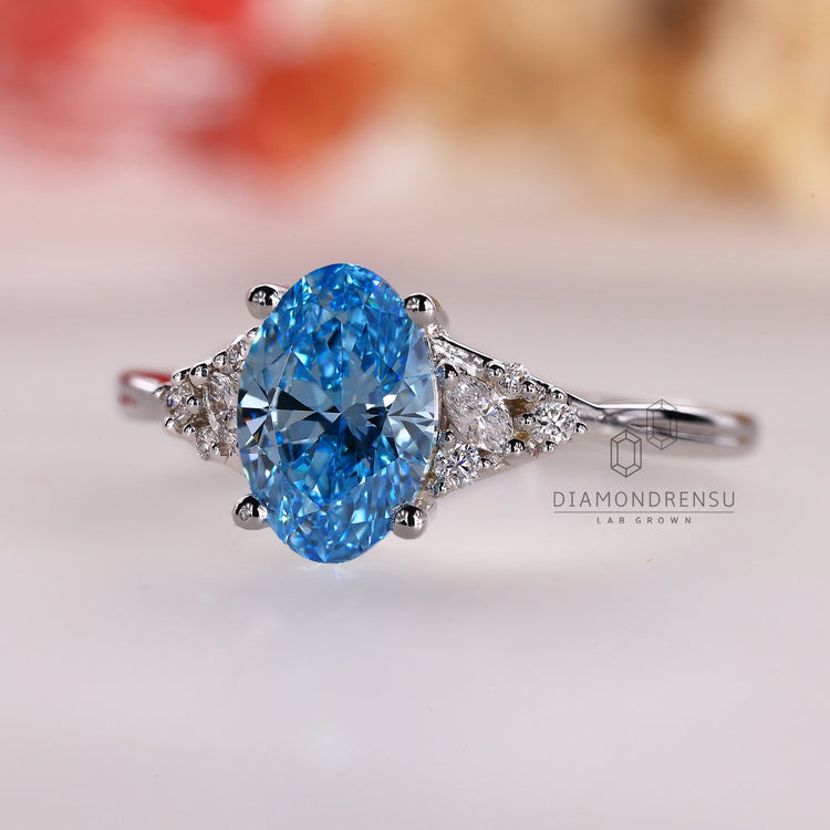 Marquise Cut Ring with a blue diamond for modern flair.