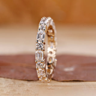 A full eternity band featuring sparkling diamonds set all around the ring.
