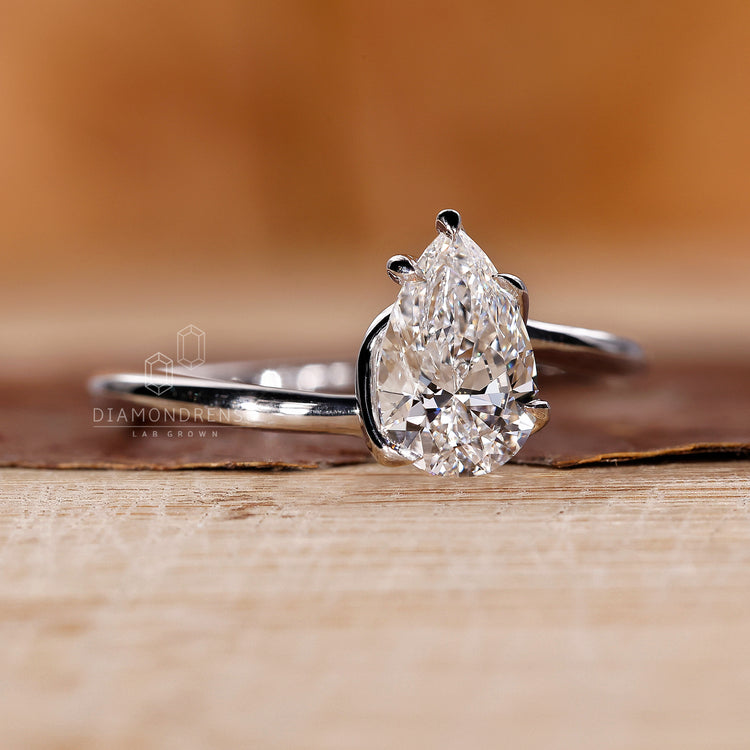 Twisted Prong Setting on a beautiful pear solitaire engagement ring.
