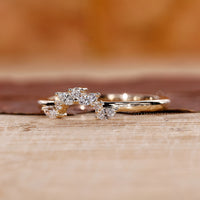 Marquise and round cut wedding band with unique stones.
