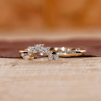 Marquise and round cut wedding band with unique stones.
