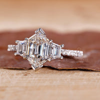 Pave diamonds enhance the beauty of this custom engagement ring.
