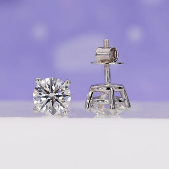 Round diamond earrings in a classic handmade studs earrings design.
