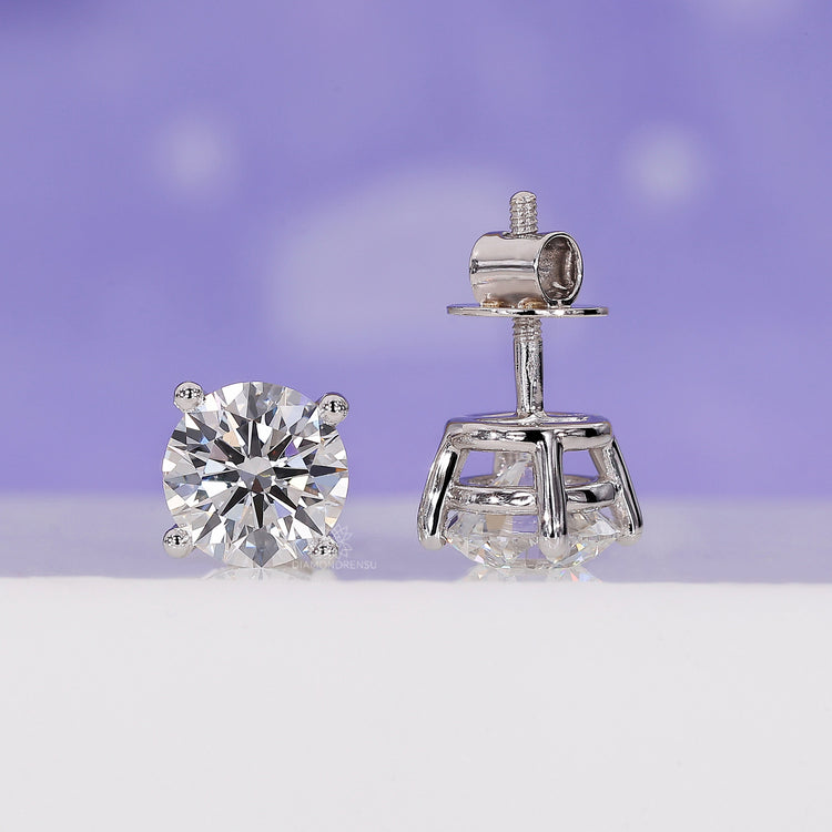 Round diamond earrings in a classic handmade studs earrings design.
