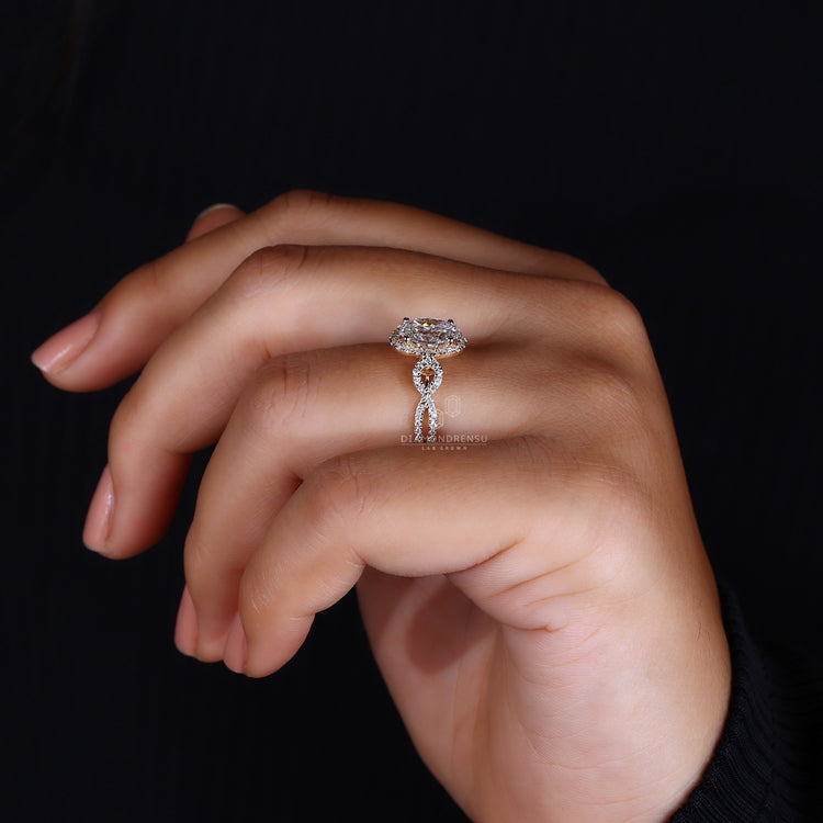 Unique twisted pave ring with delicate details and shimmering diamonds.
